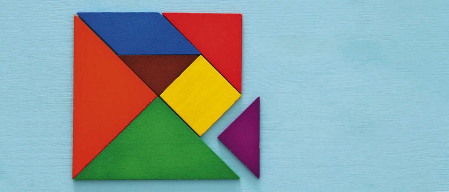 Ehrenamt im unterfränkischen Handwerk, dargestellt durch bunte Steine die ein Viereck ergeben