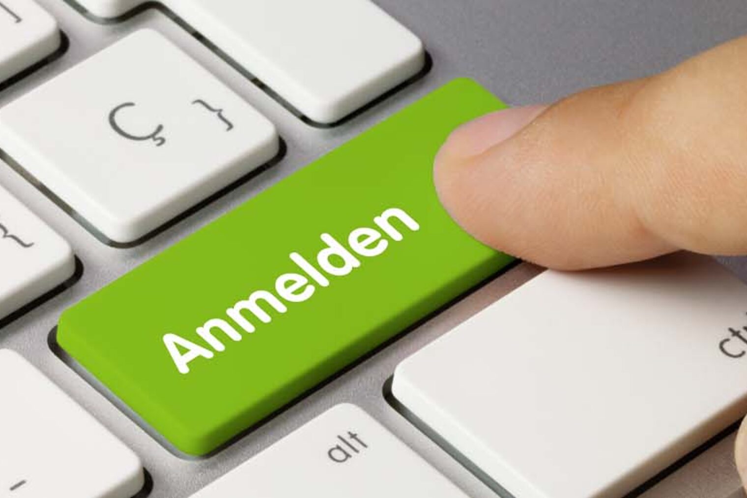 Symbolbild Anmelden Button auf Tastatur