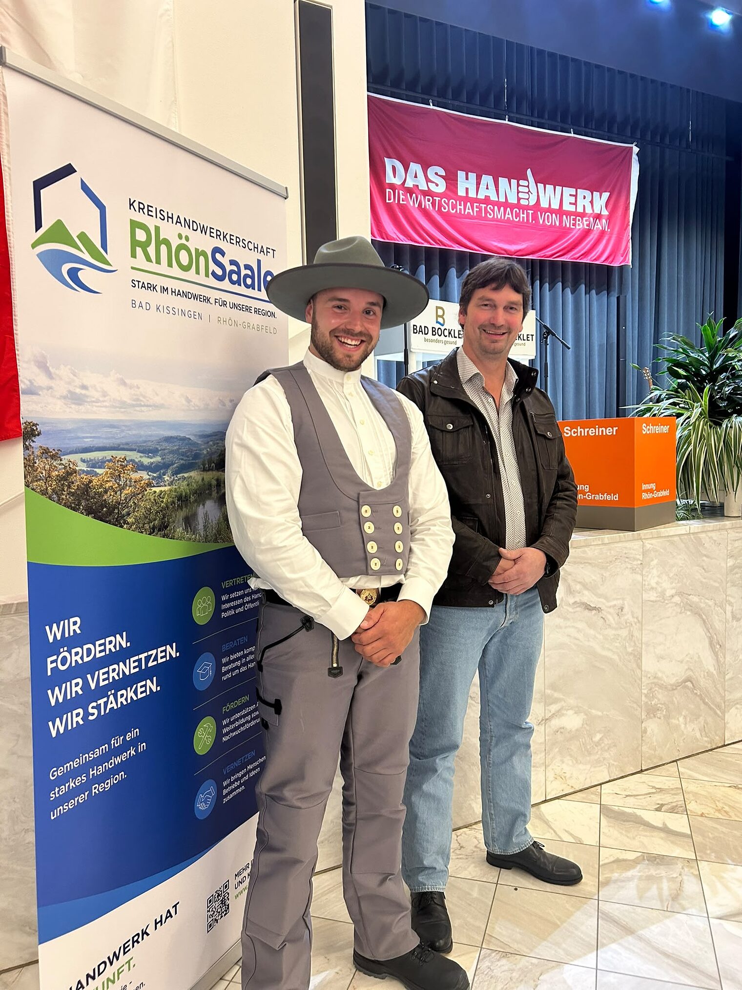 Kammeresieger und Chef auf Feier
